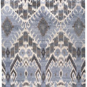 A contemporary rug with light blue, white, and brown design