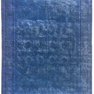 An overdyed/vintage deep blue rug