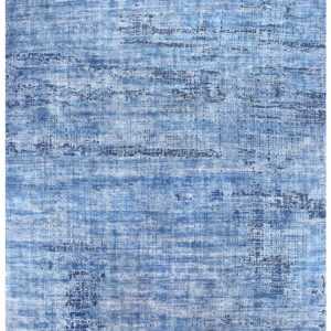 A modern blue rug with weave grain