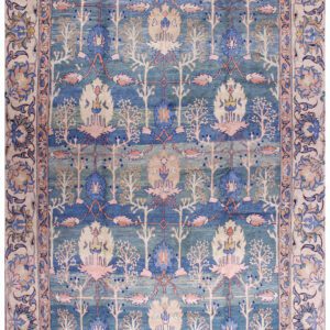 An antique/collectable rug with a blue background, pink border, and intricate design